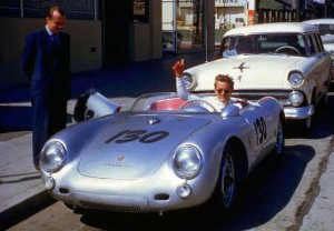 September 1955, Hollywood, Los Angeles, California, USA --- Actor James Dean gives a thumbs-up sign from his Porsche 550 Spyder, the , while parked on Vine Street in Hollywood. Dean, who had taken up racing the year before, owned the car only nine days when he lost his life in a fatal highway accident while driving the Porsche to a Salinas race. --- Image by © Bettmann/CORBIS